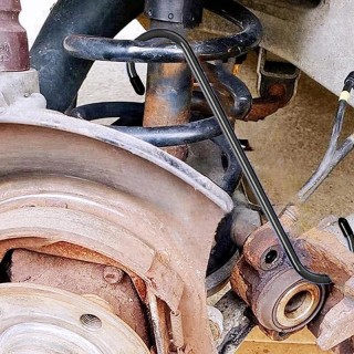 Инструмент за смяна на накладки